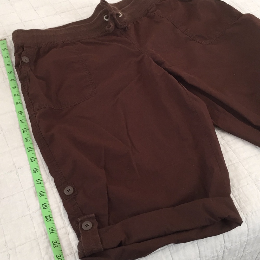 Adjustable length capris